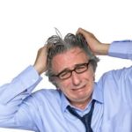 Fotolia_1928868_M Mann rauft sich die Haare